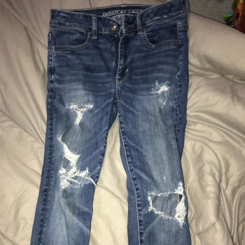 American Eagle jeans, ripped, light wash.
